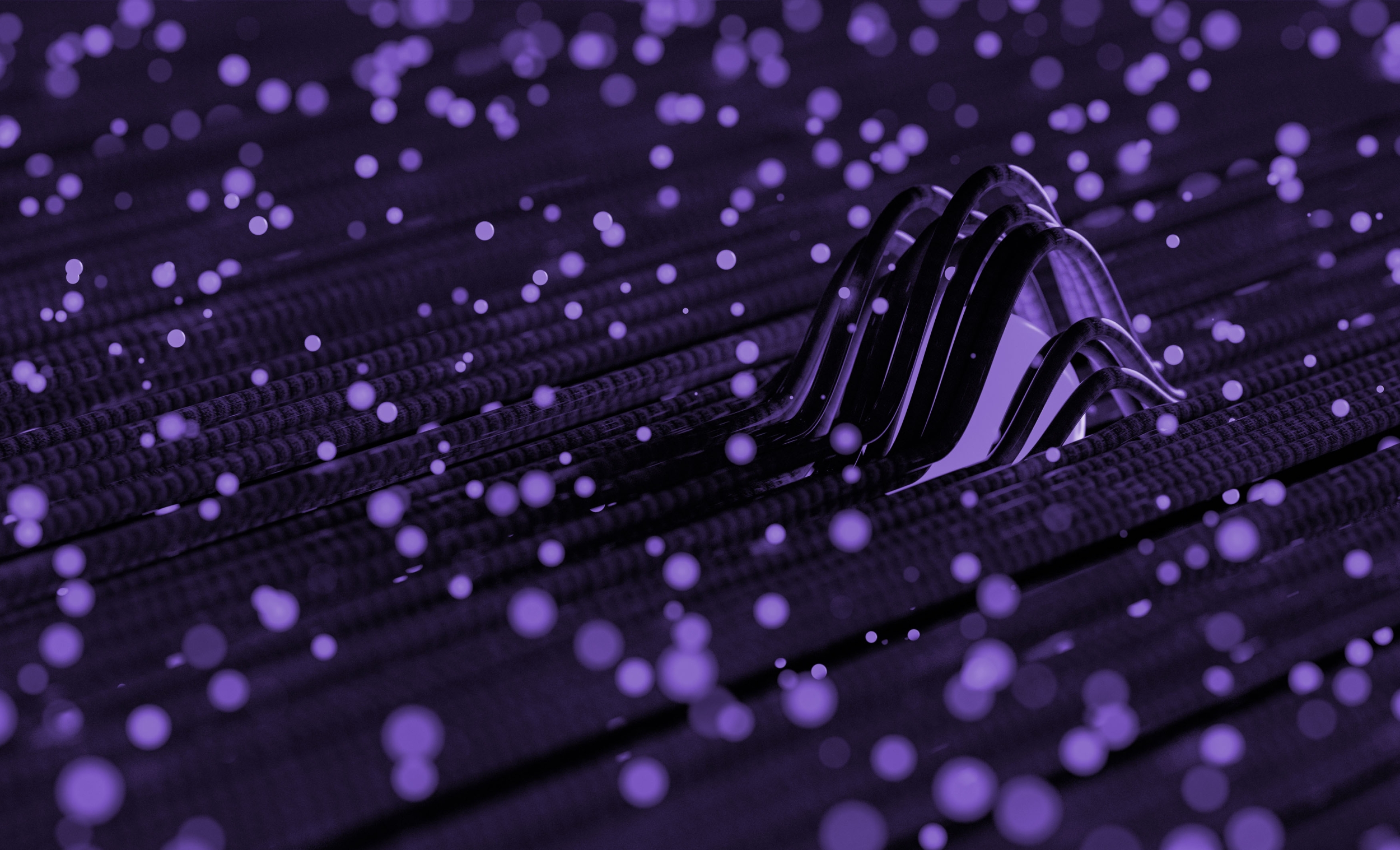 Abstract image in purple and black representing data and metrics.